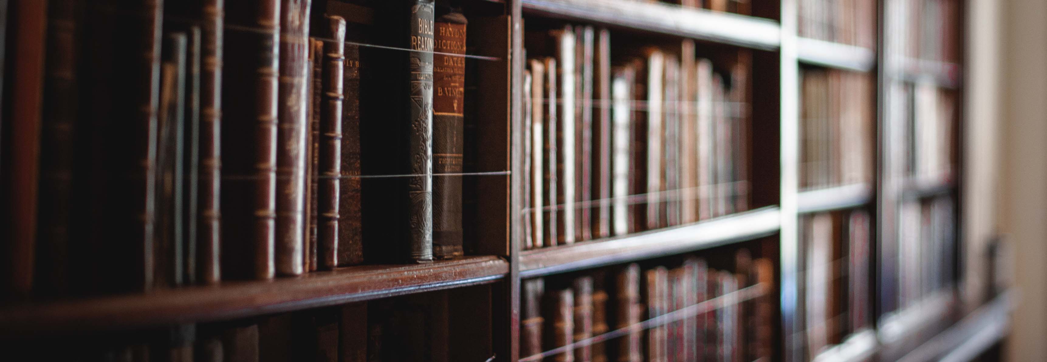 A bookshelf with vintage books 1159515